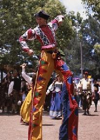 jester mardi gras stilt walker stiltwalker cirque